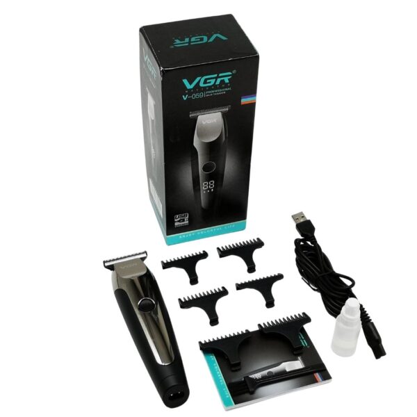 VGR V 059 slika 016 - Ova precizna, bežična i profesionalna mašinica VGR V - 059 će Vam omogućiti da veoma lako i jednostavno sredite Vašu ili tuđu kosu, skratite i oblikujete bradu bilo u toplini Vašeg doma ili za potrebe frizerskog salona. Oštrice na mašinici su napravljene od visokokvalitetnog nerđajućeg čelika i dolazi sa 6 nastavaka. (1mm, 2mm, 3mm, 4mm, 5mm, 6mm). Za korišćenje je takođe veoma praktična jer je kompaktnog dizajna. Ima tri brzine rada i puni se pomoću USB-a, a na LED displeju možete videti procenat baterije odnosno koji je u tom trenutku nivo rada Vaše VGR mašinice.