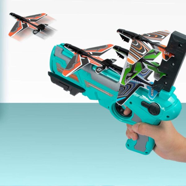 Bubble Catapult Plane Gun Air Battle Game 2021 New Hot Toy Shooting Game Toy for Kids One Click Ejection Model Foam Airplane Outdoor Sport Toys Birthday Party Favors Foam Airplane BlueYellow 1 - Pištolj sadrži 4 aviona koje ispaljuje. Dimenzija pištolja: 25 x 15cm Dimenzija aviona: 14 x 9cm