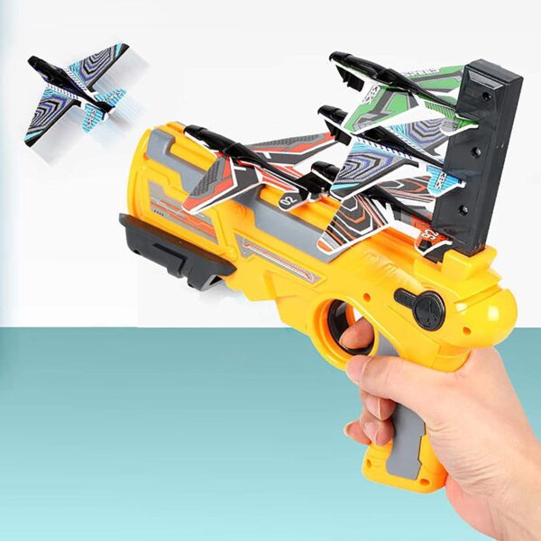 Bubble Catapult Plane Gun Air Battle Game 2021 New Hot Toy Shooting Game Toy for Kids One Click Ejection Model Foam Airplane Outdoor Sport Toys Birthday Party Favors Foam Airplane BlueYellow 2 - Pištolj sadrži 4 aviona koje ispaljuje. Dimenzija pištolja: 25 x 15cm Dimenzija aviona: 14 x 9cm