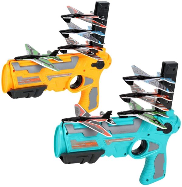 Bubble Catapult Plane Gun Air Battle Game 2021 New Hot Toy Shooting Game Toy for Kids One Click Ejection Model Foam Airplane Outdoor Sport Toys Birthday Party Favors Foam Airplane BlueYellow - Pištolj sadrži 4 aviona koje ispaljuje. Dimenzija pištolja: 25 x 15cm Dimenzija aviona: 14 x 9cm