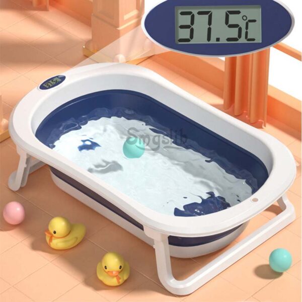 Foldable Baby Bathtub With Thermometer Bath and Shower Baby Bathtubs Bath Tub Bath Bucket Folding Bath - Rasklopiva kadica za kupanje beba.  Čvrsta i stabilna, kvalitetna kadica lako sklopivi.  Poseduje merač temperature i displej na kom je prikazana.  Dimenzije 75.5X47X21.5 CM